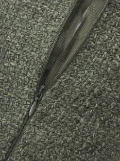 Cojín rulo en tejido bouclé con ribete Aya