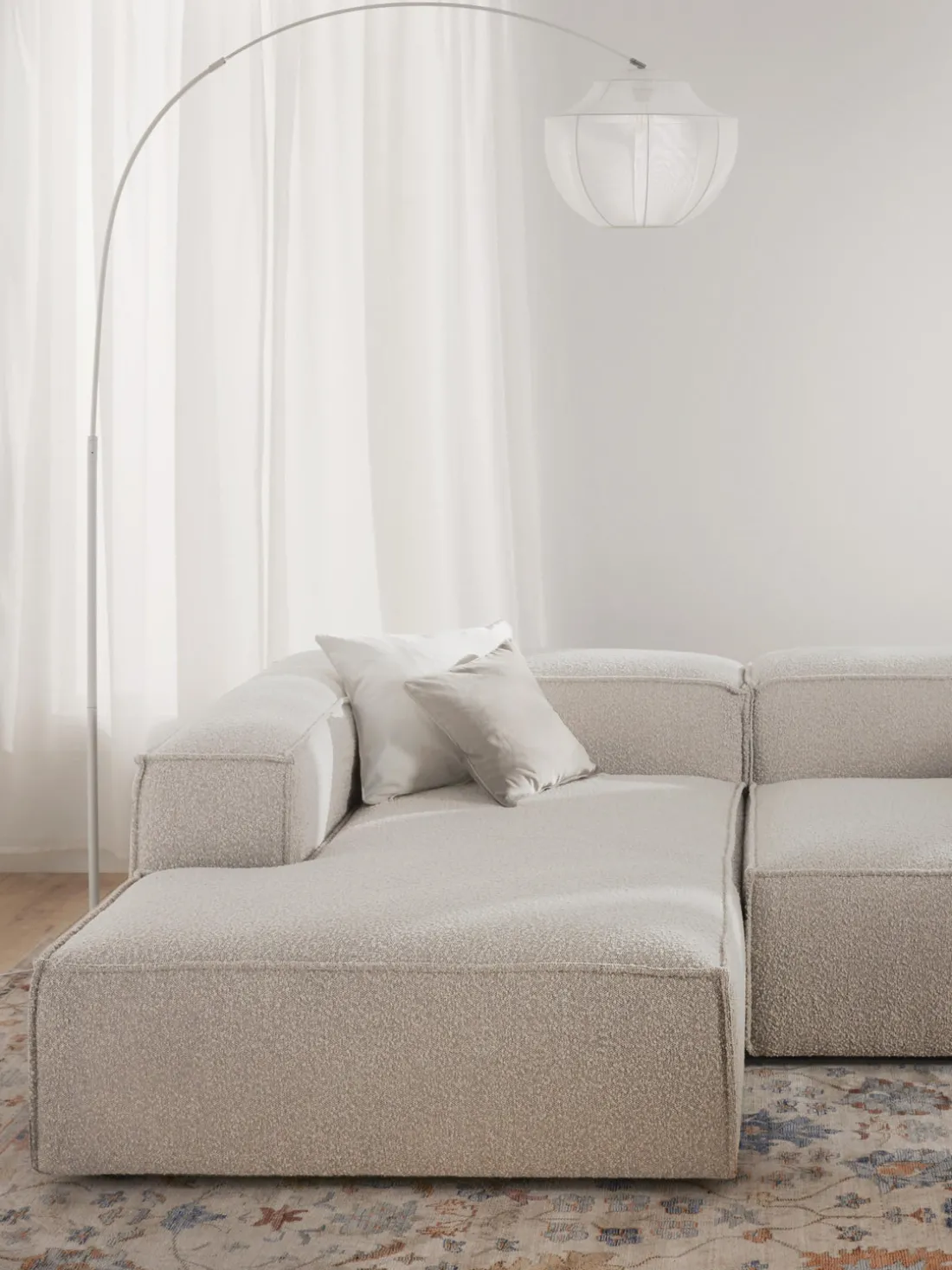 Diván rinconero modular en tejido bouclé Lennon