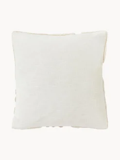 Funda de cojín artesanal con relieves Coraline