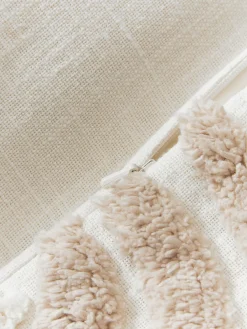 Funda de cojín artesanal con relieves Coraline