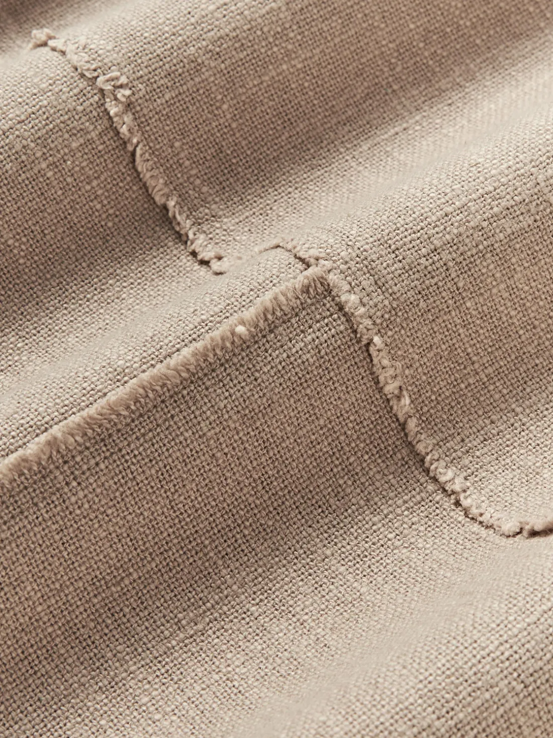 Funda de cojín artesanal con costura decorativa Terre