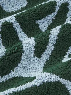 Funda de cojín artesanal con mechones en bucle Soma