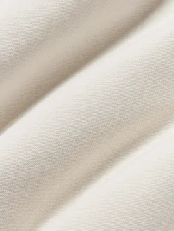 Funda de cojín capitoné con mechones decorativos Malu