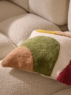 Funda de cojín capitoné con mechones decorativos Malu