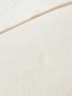 Funda de cojín de pelo sintético rizado Morten