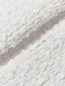 Funda de cojín en tejido bouclé Bellamie