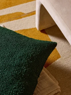 Funda de cojín en tejido bouclé Bellamie