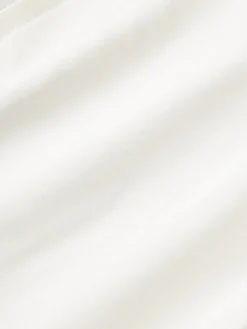 Funda de cojín para exterior con tejido artesanal y flecos Suria