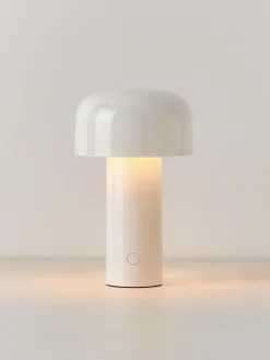 Lámpara de mesa LED pequeña regulable Bellhop, portátil