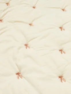 Manta acolchada de algodón ecológico Bows