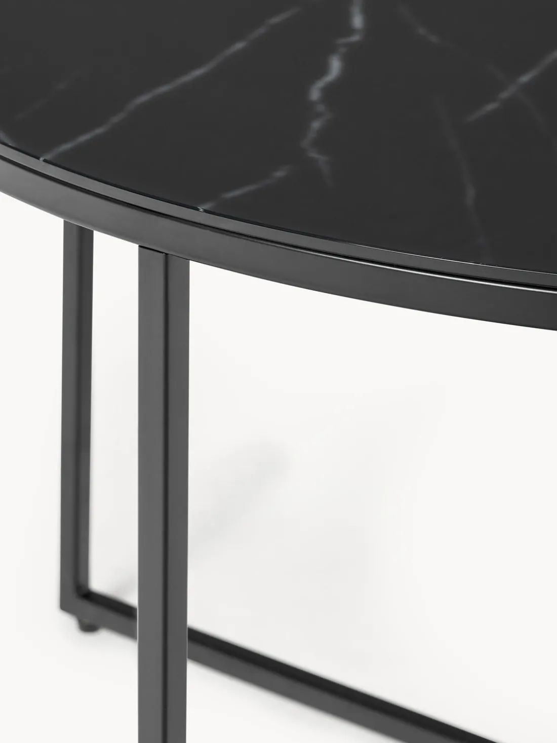 Mesa de centro redonda con tablero de vidrio en look mármol Antigua