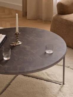 Mesa de centro redonda grande Antigua, tablero de vidrio en aspecto mármol