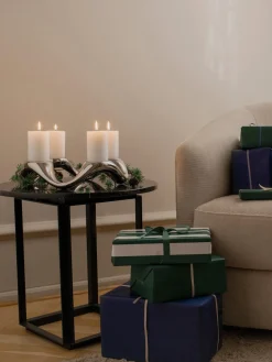 Portavela de acero inoxidable con forma orgánica Cobra