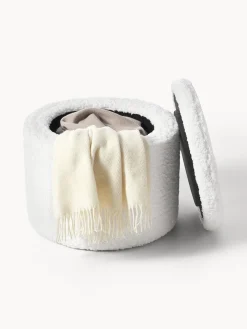 Puf de borreguillo con espacio de almacenamiento Alida