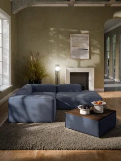 Reposapiés puf con espacio de almacenamiento Lennon