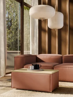 Reposapiés puf con espacio de almacenamiento Lennon