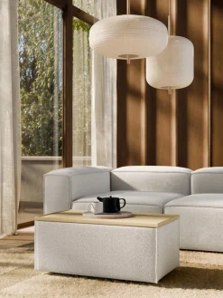 Reposapiés puf en tejido bouclé con espacio de almacenamiento Lennon