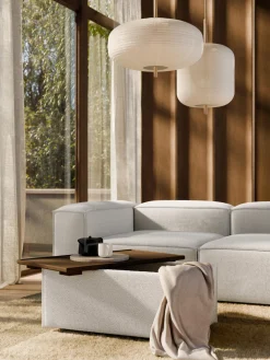 Reposapiés puf en tejido bouclé con espacio de almacenamiento Lennon