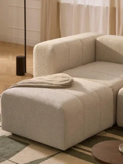 Reposapiés puf en tejido bouclé Lena