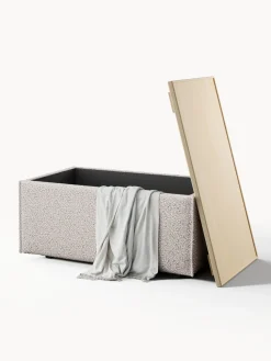 Reposapiés puf en tejido bouclé con espacio de almacenamiento Lennon