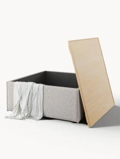 Reposapiés puf en tejido bouclé con espacio de almacenamiento Lennon