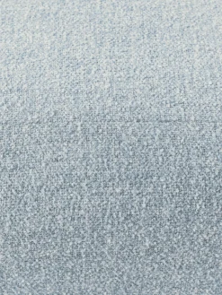 Reposapiés puf en tejido bouclé Wolke