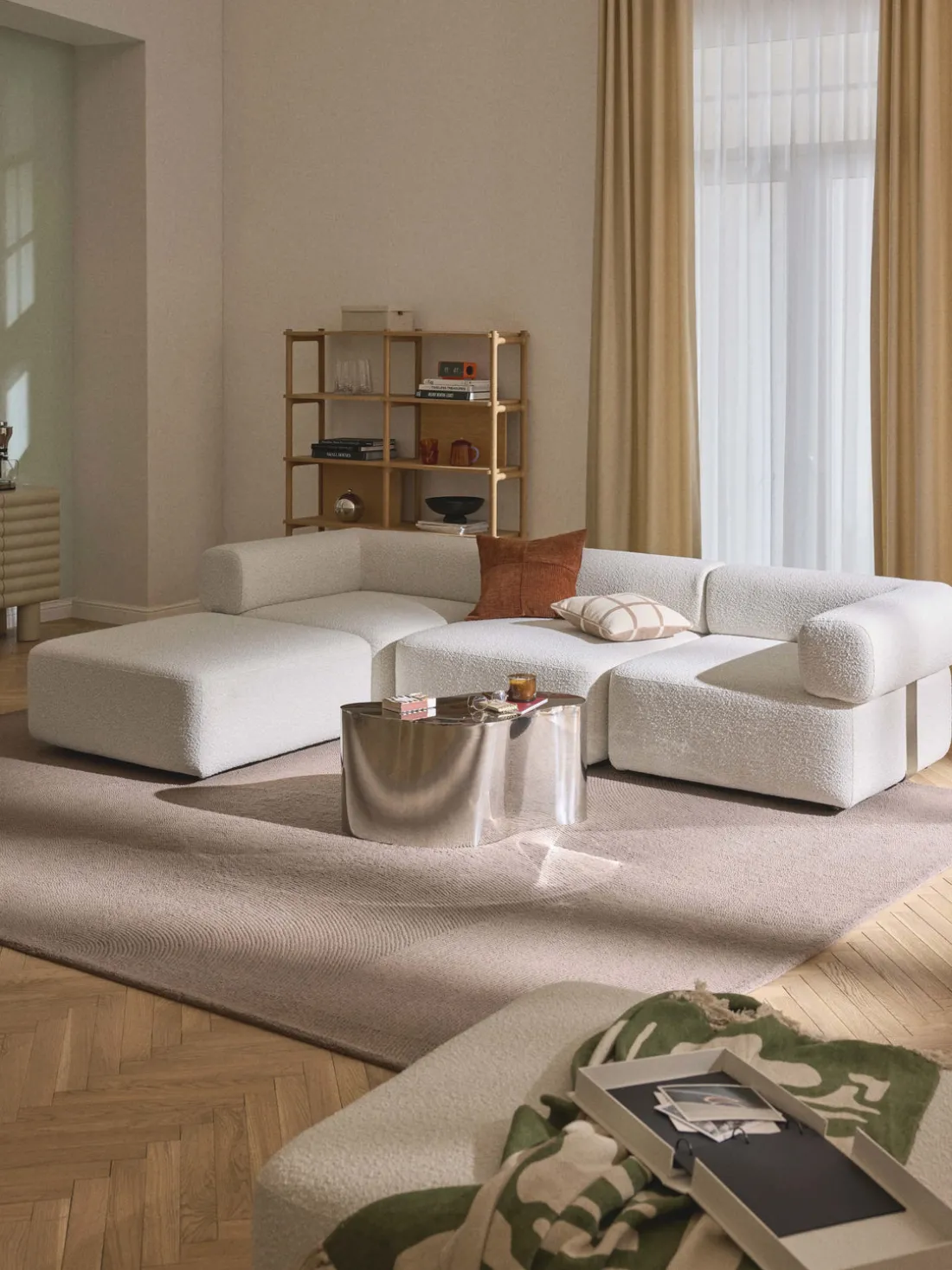 Reposapiés puf en tejido bouclé Anton