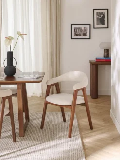 Silla con reposabrazos tapizada Nik