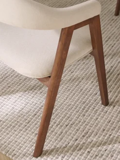 Silla con reposabrazos tapizada Nik