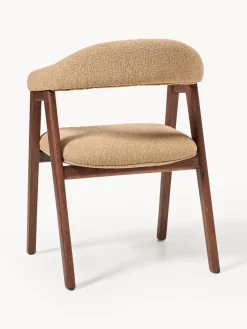 Silla con reposabrazos tapizada en tejido bouclé Nik