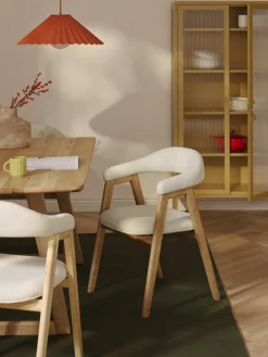 Silla con reposabrazos tapizada Nik