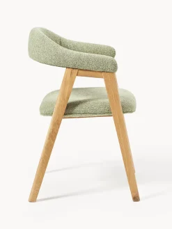 Silla con reposabrazos tapizada en tejido bouclé Nik