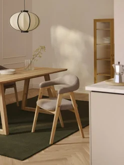 Silla con reposabrazos tapizada Nik