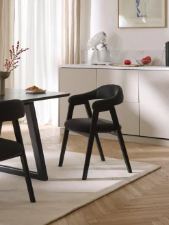 Silla con reposabrazos tapizada Nik