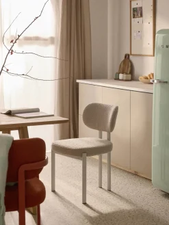 Silla tapizada en tejido bouclé Adrien