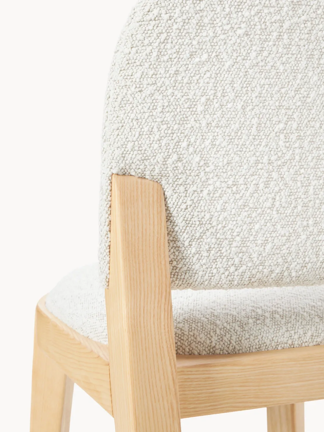 Silla tapizada en tejido bouclé Neelia