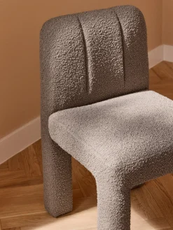 Silla tapizada en tejido bouclé Lukas
