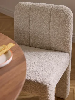 Silla tapizada en tejido bouclé Lukas