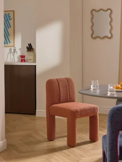 Silla tapizada en tejido bouclé Lukas