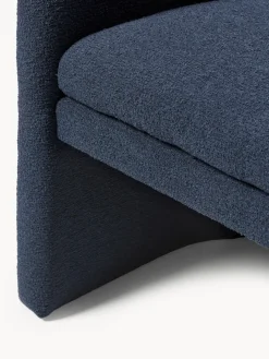 Sillón con reposabrazos en tejido bouclé Mairo