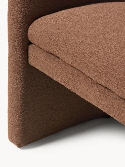 Sillón con reposabrazos en tejido bouclé Mairo