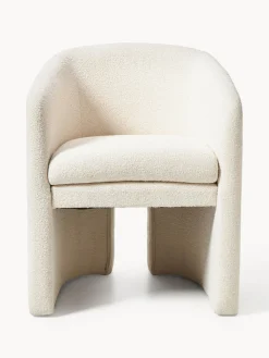 Sillón con reposabrazos en tejido bouclé Mairo