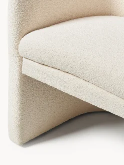 Sillón con reposabrazos en tejido bouclé Mairo