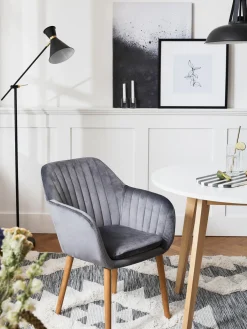 Sillón de terciopelo con patas de madera Emilia