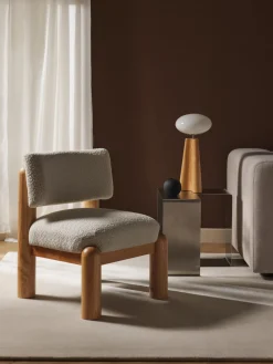 Sillón en tejido bouclé Dalma