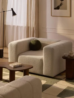 Sillón en tejido bouclé Lena