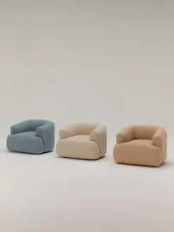 Sillón en tejido bouclé Sofia