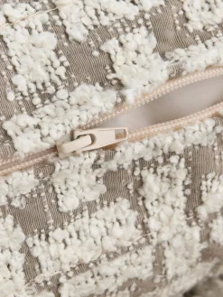 Sillón en tejido bouclé Stories