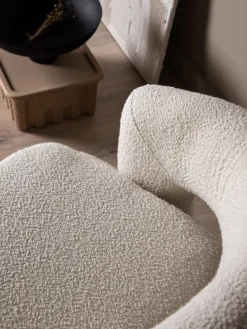 Sillón giratorio en tejido bouclé Laurel