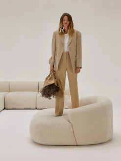 Sillón lounge grande en tejido bouclé Sofia